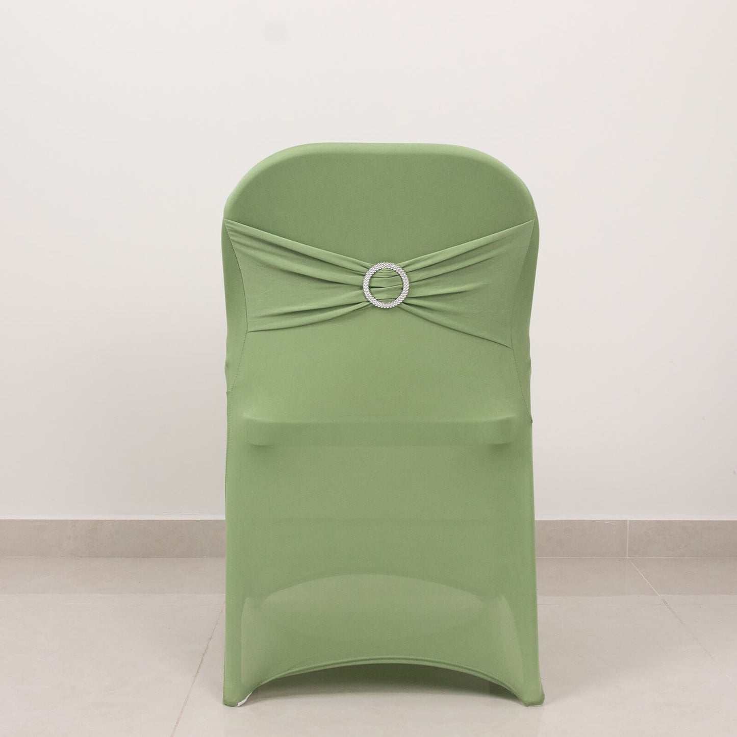 Sage green spandex folding chair cover with rhinestone sash band.