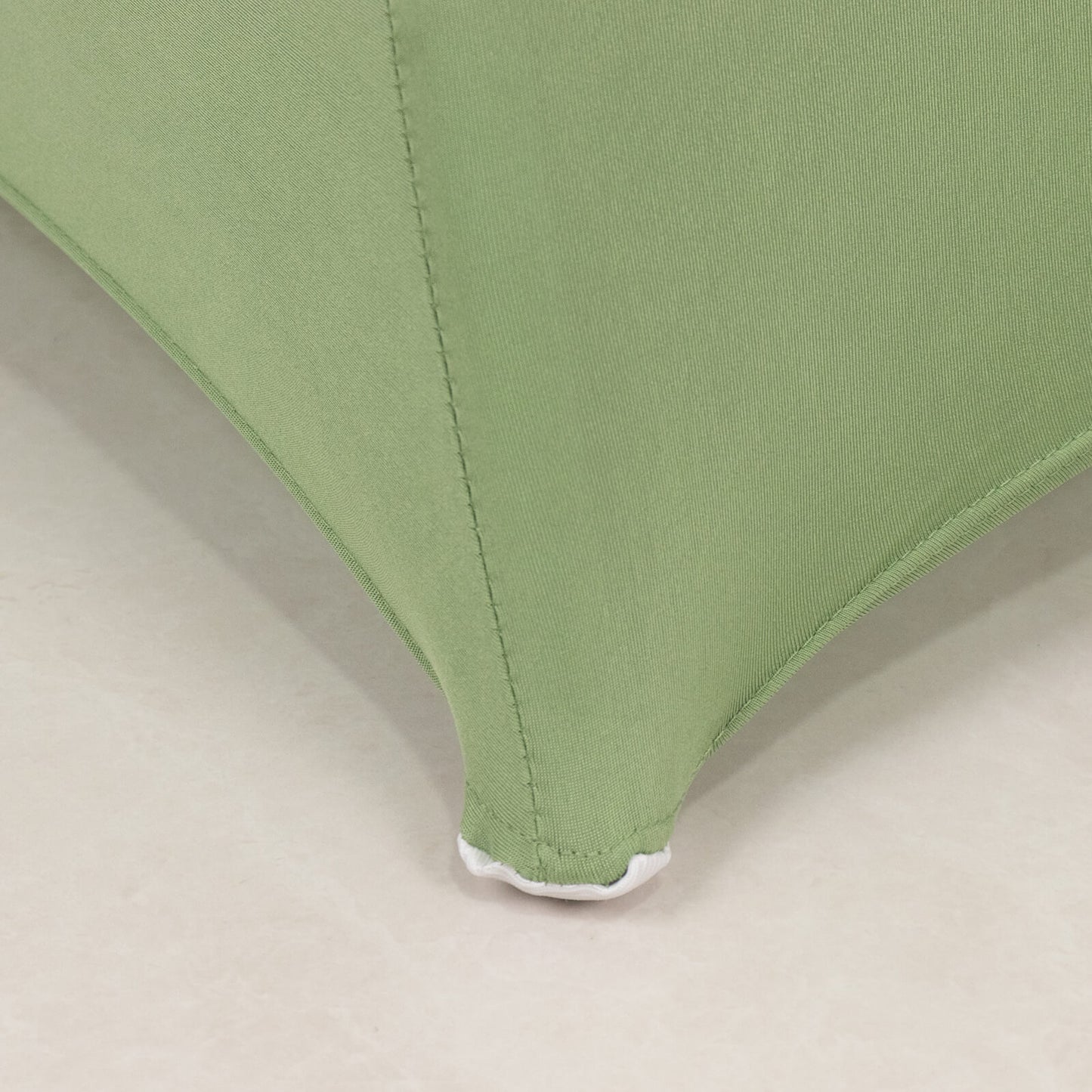 Sage green spandex folding chair cover with rhinestone sash.