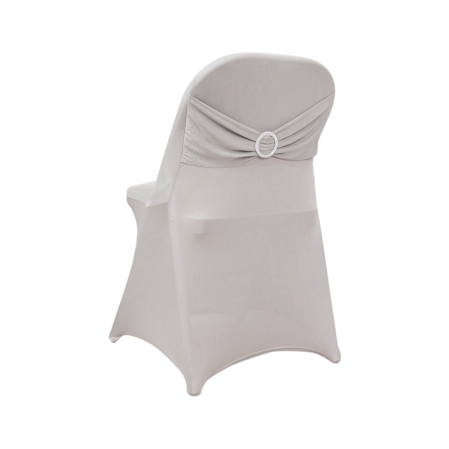 Silver spandex folding chair cover with rhinestone sash.