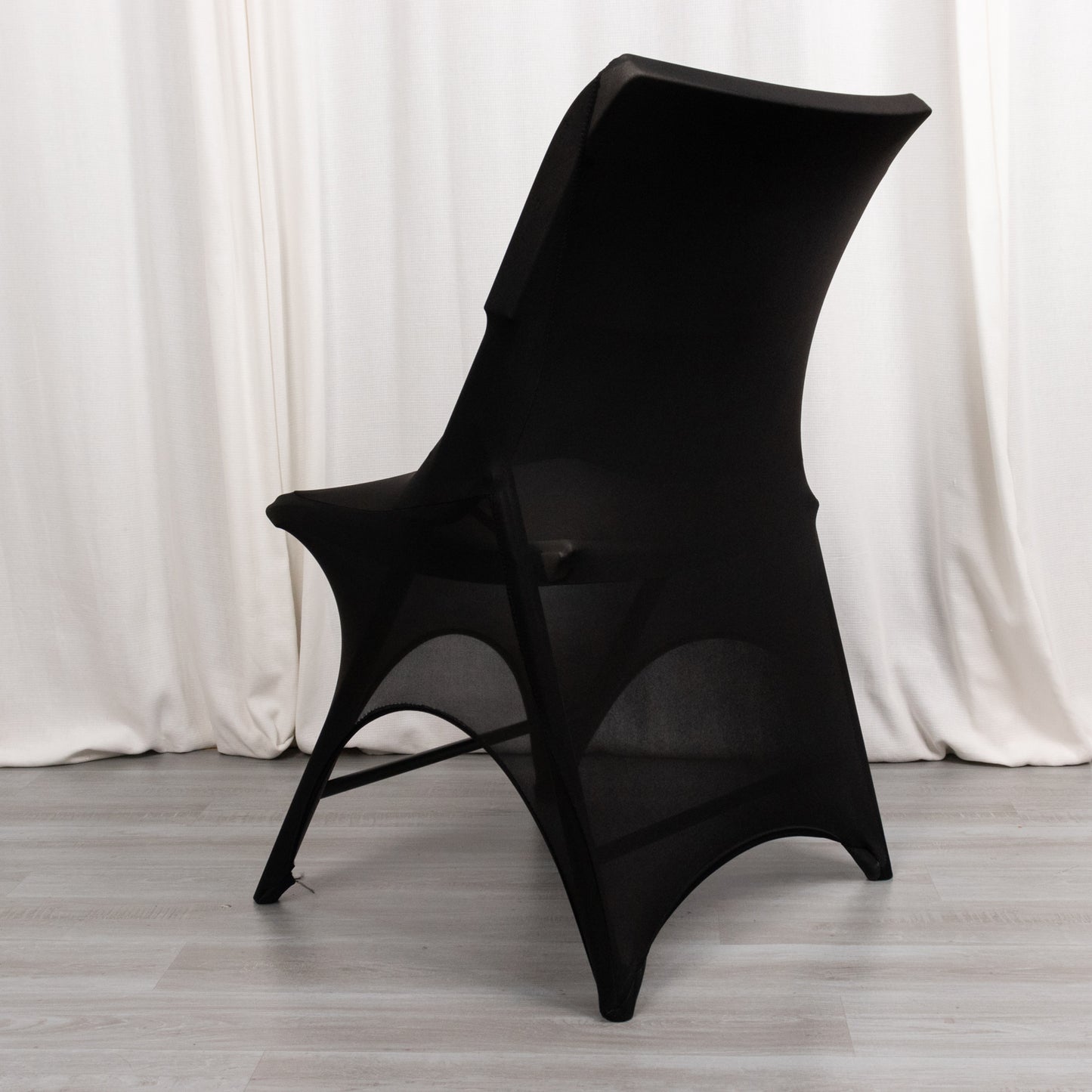 Black spandex wedding chair cover with 3-way open arch.