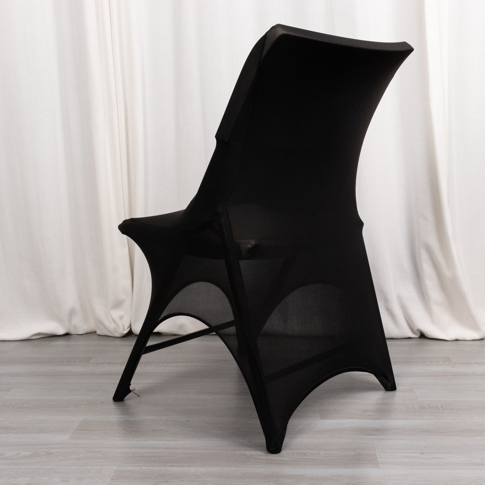 Black spandex wedding chair cover with 3-way open arch.