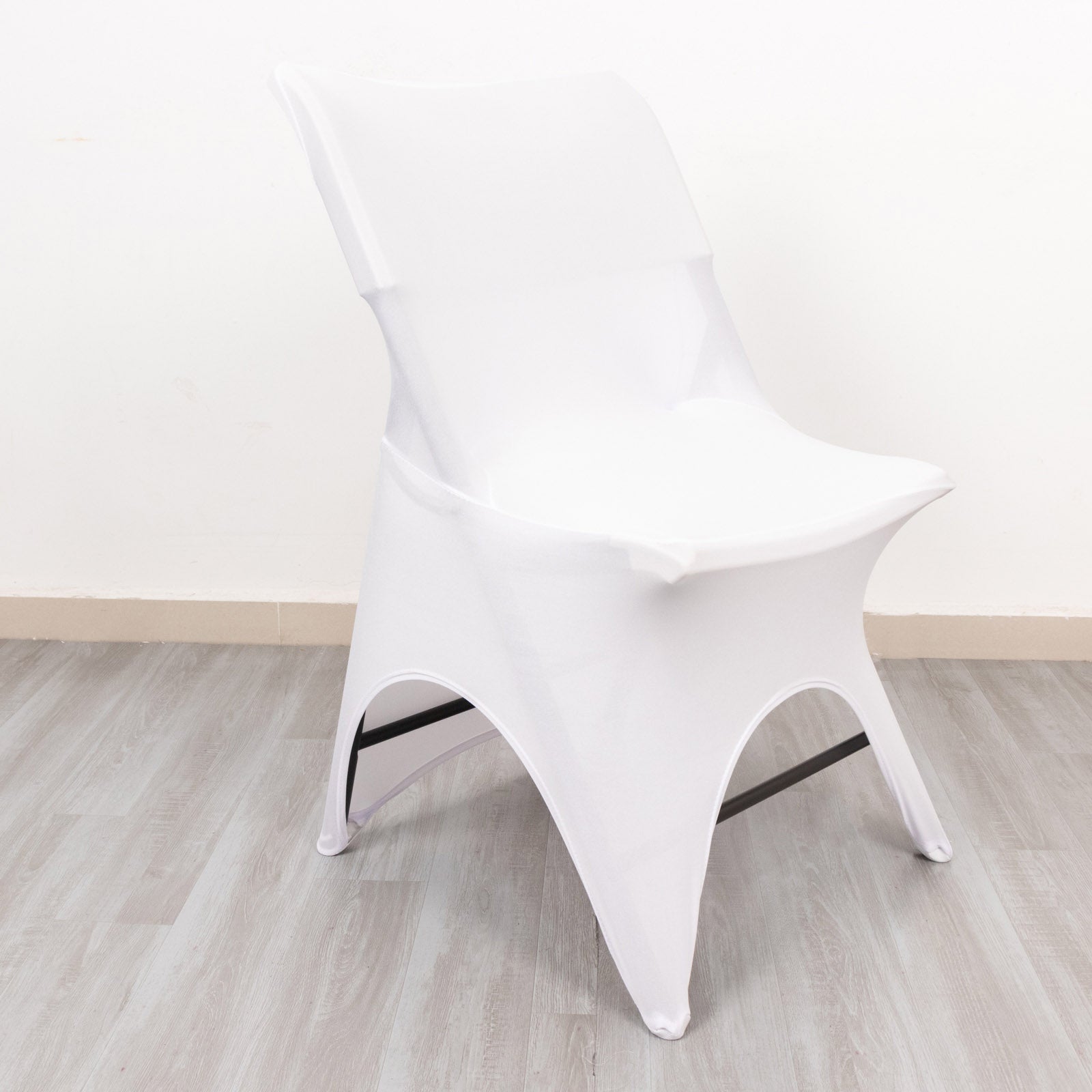 White premium spandex wedding chair cover with fitted design and foot pockets.