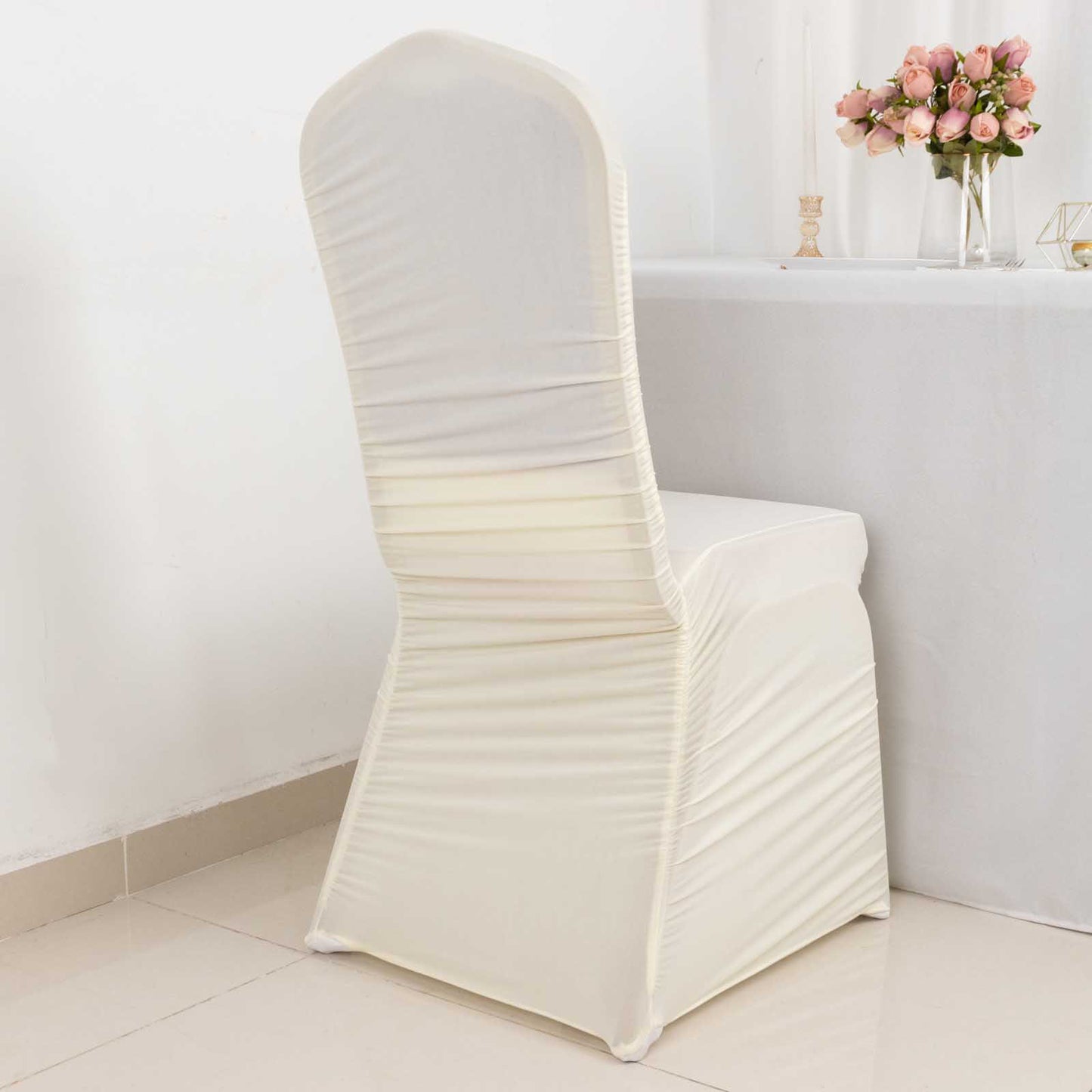 Ivory fitted spandex banquet chair cover for elegant events.