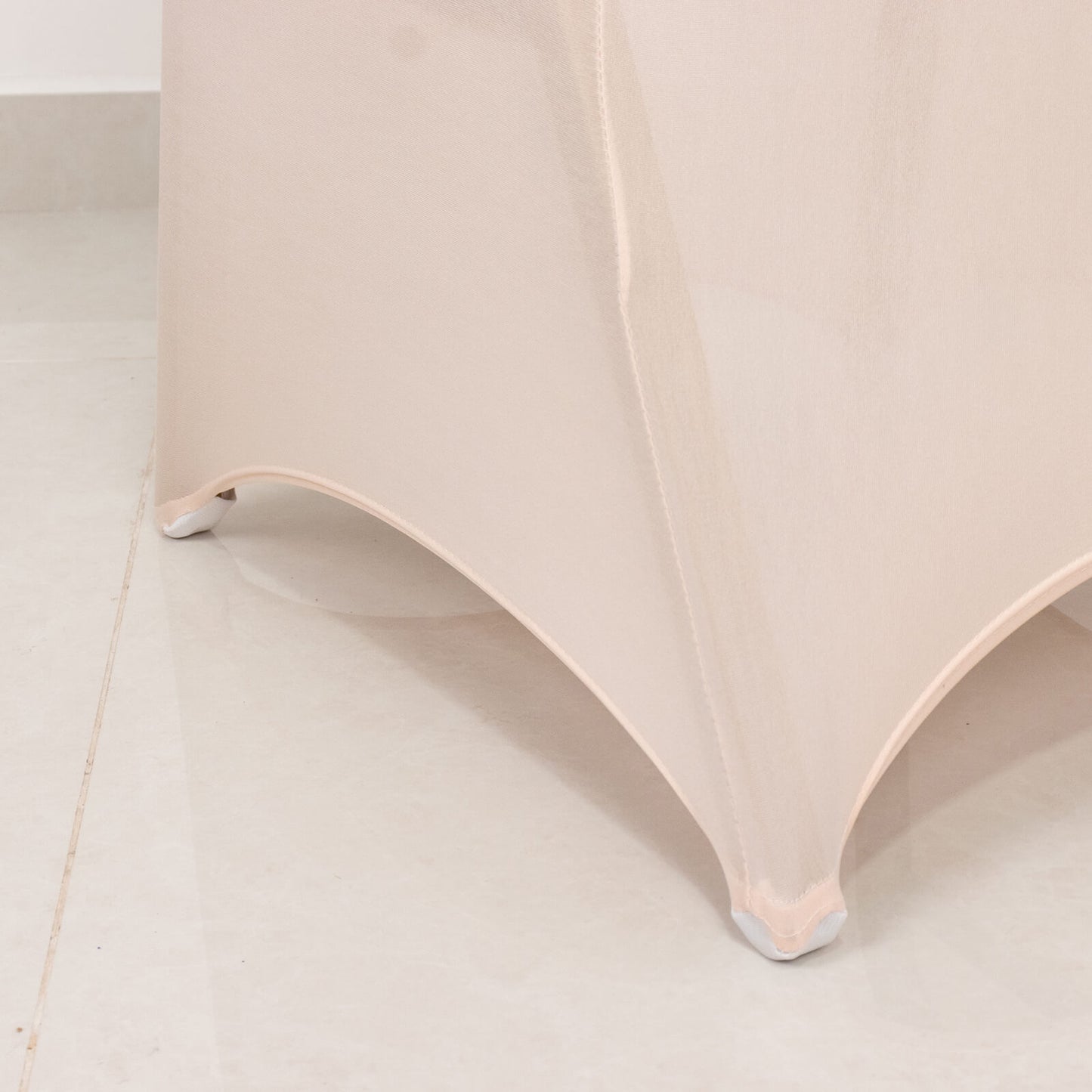 Blush banquet chair cover with silver rhinestone sash band.