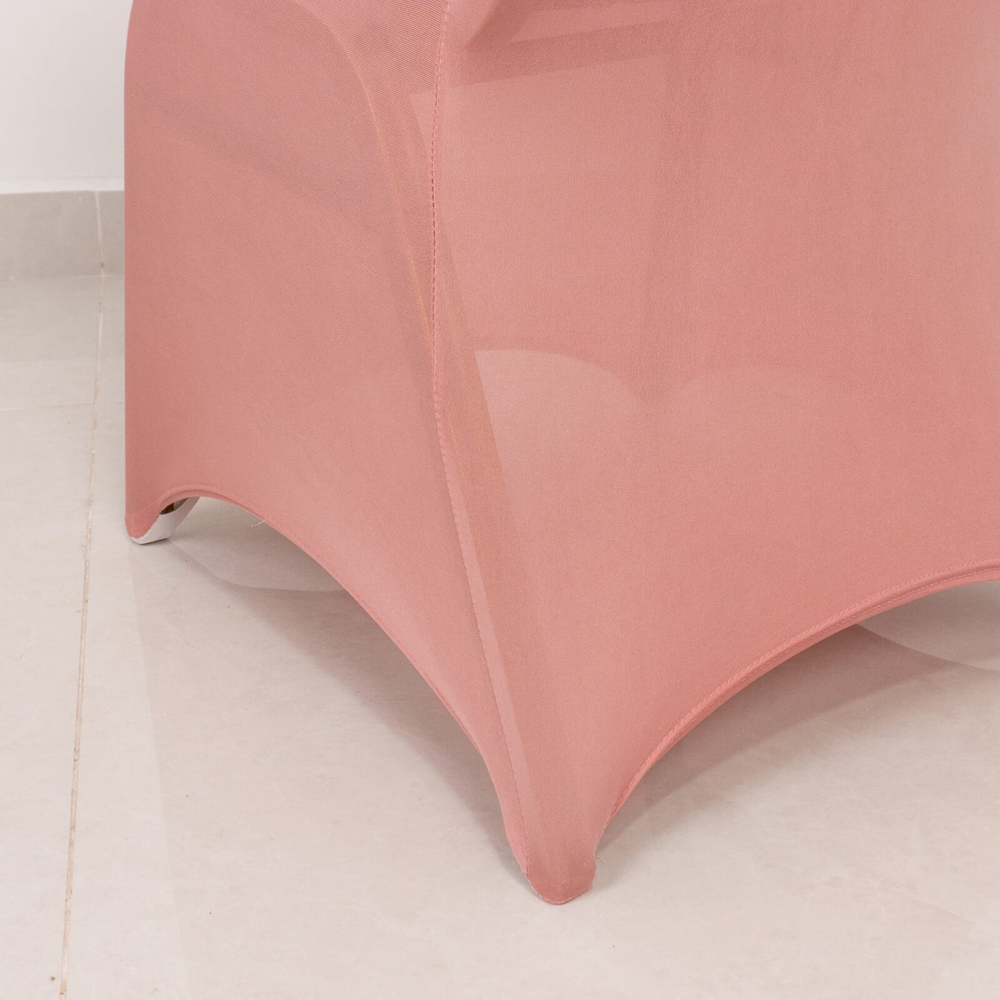 Dusty rose spandex banquet chair cover with rhinestone sash.