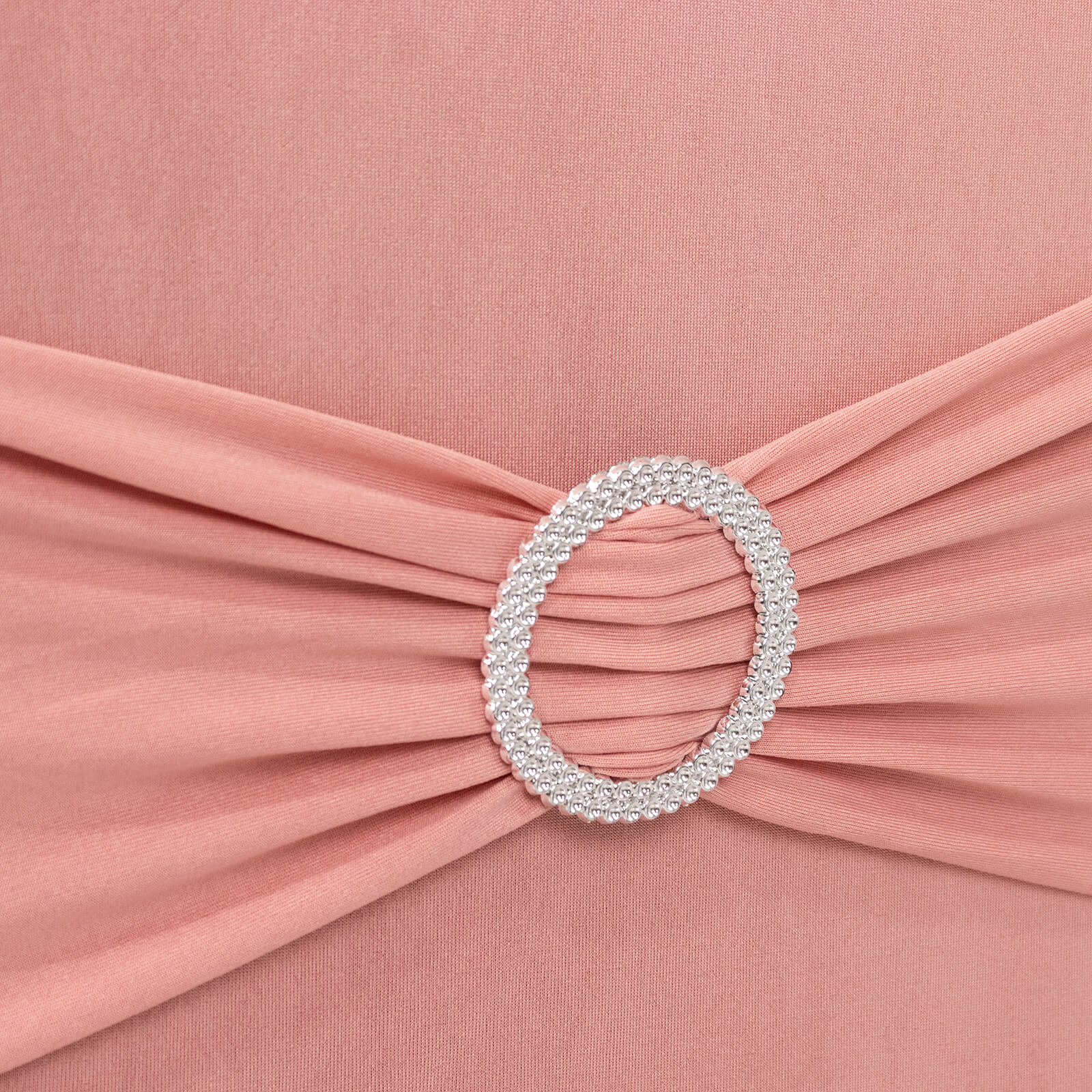 Dusty rose spandex chair cover with silver rhinestone buckle detail.