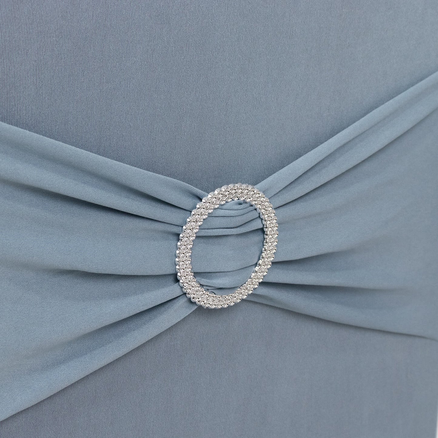 Dusty blue banquet chair cover with silver rhinestone sash.