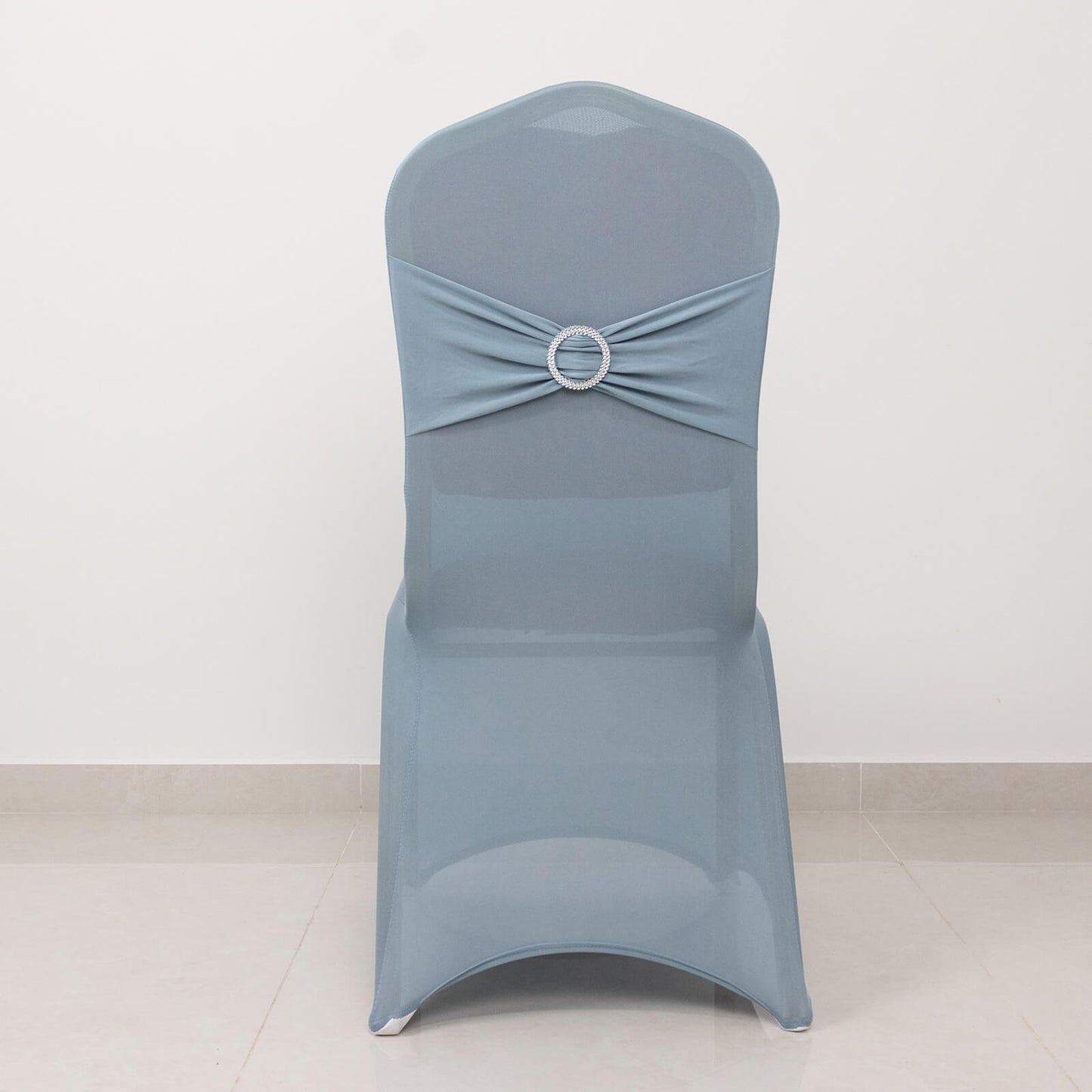 Dusty blue spandex banquet chair cover with rhinestone sash.