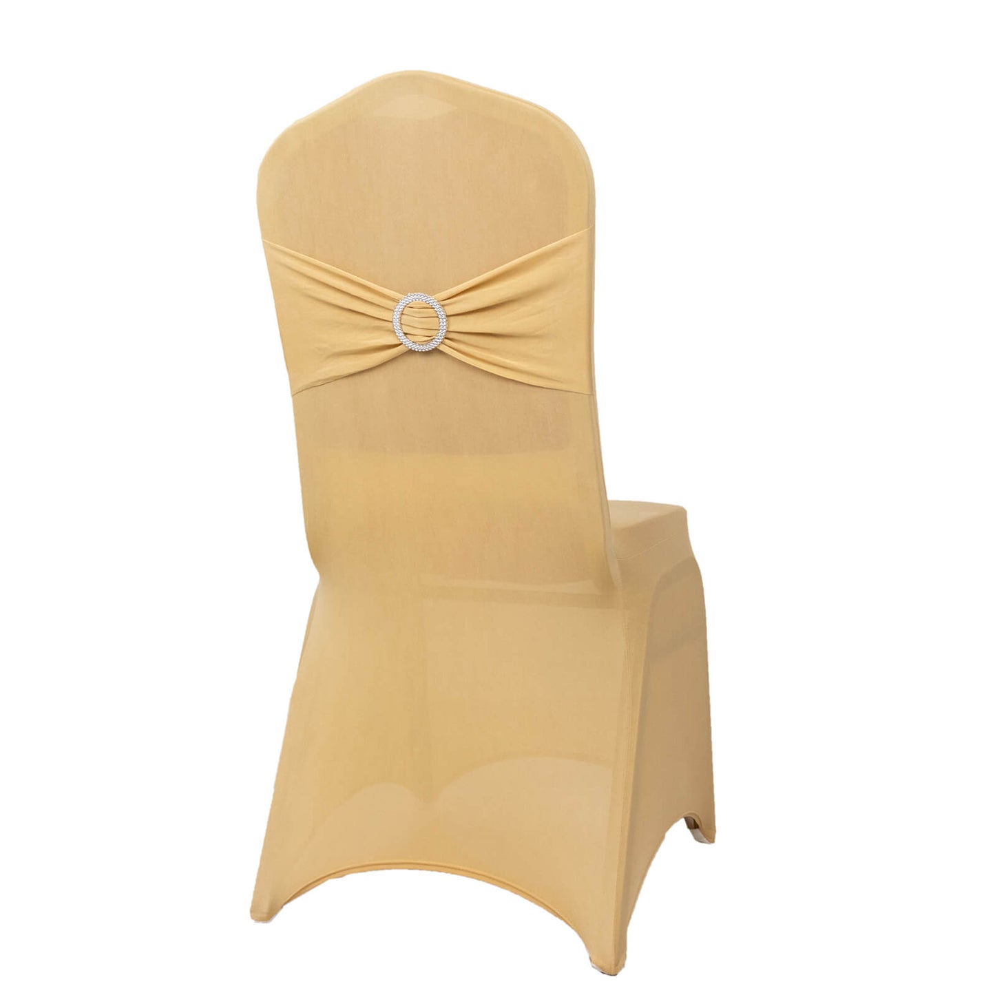 Champagne chair cover with silver rhinestone buckle on a banquet chair.