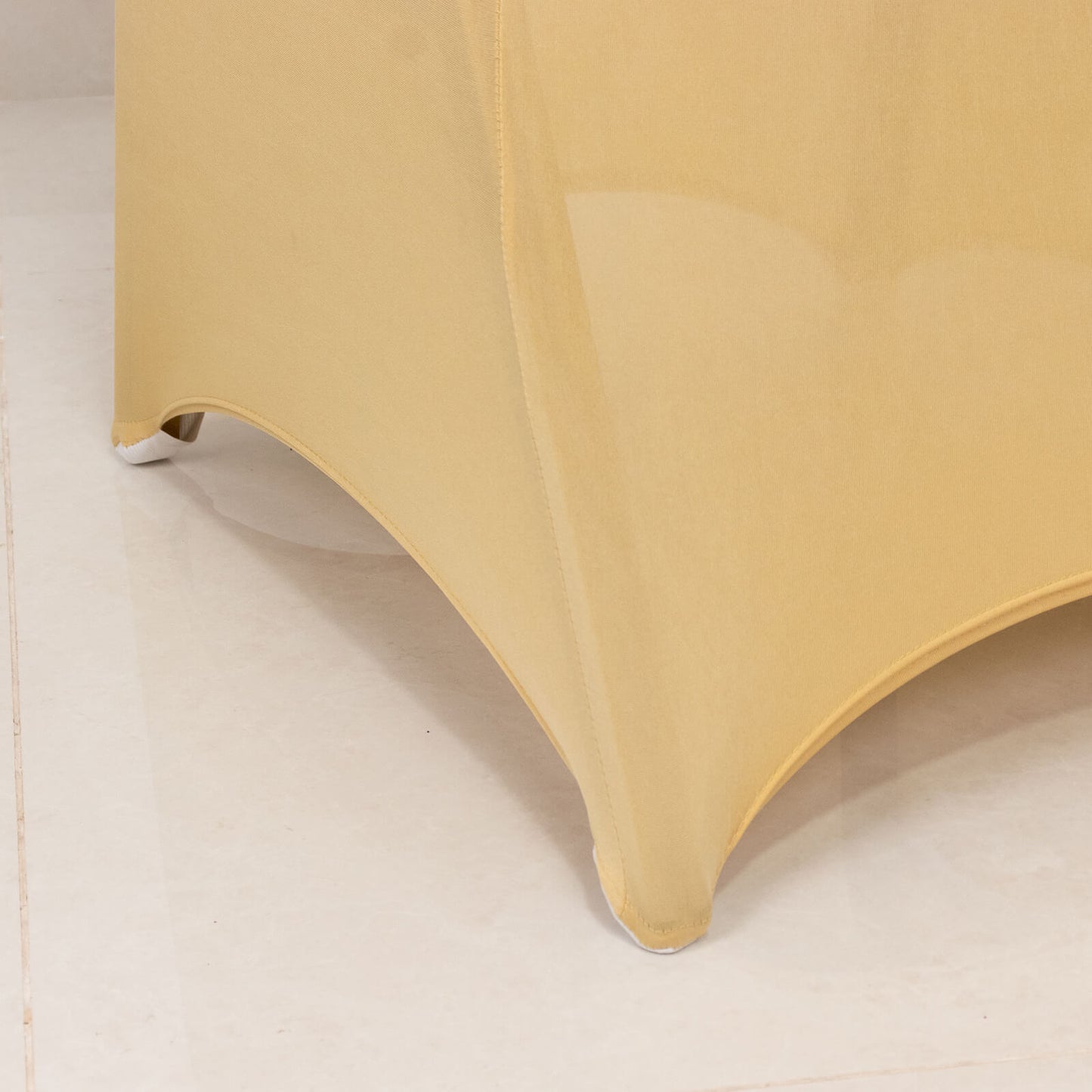 Champagne spandex banquet chair cover with silver rhinestone sash.