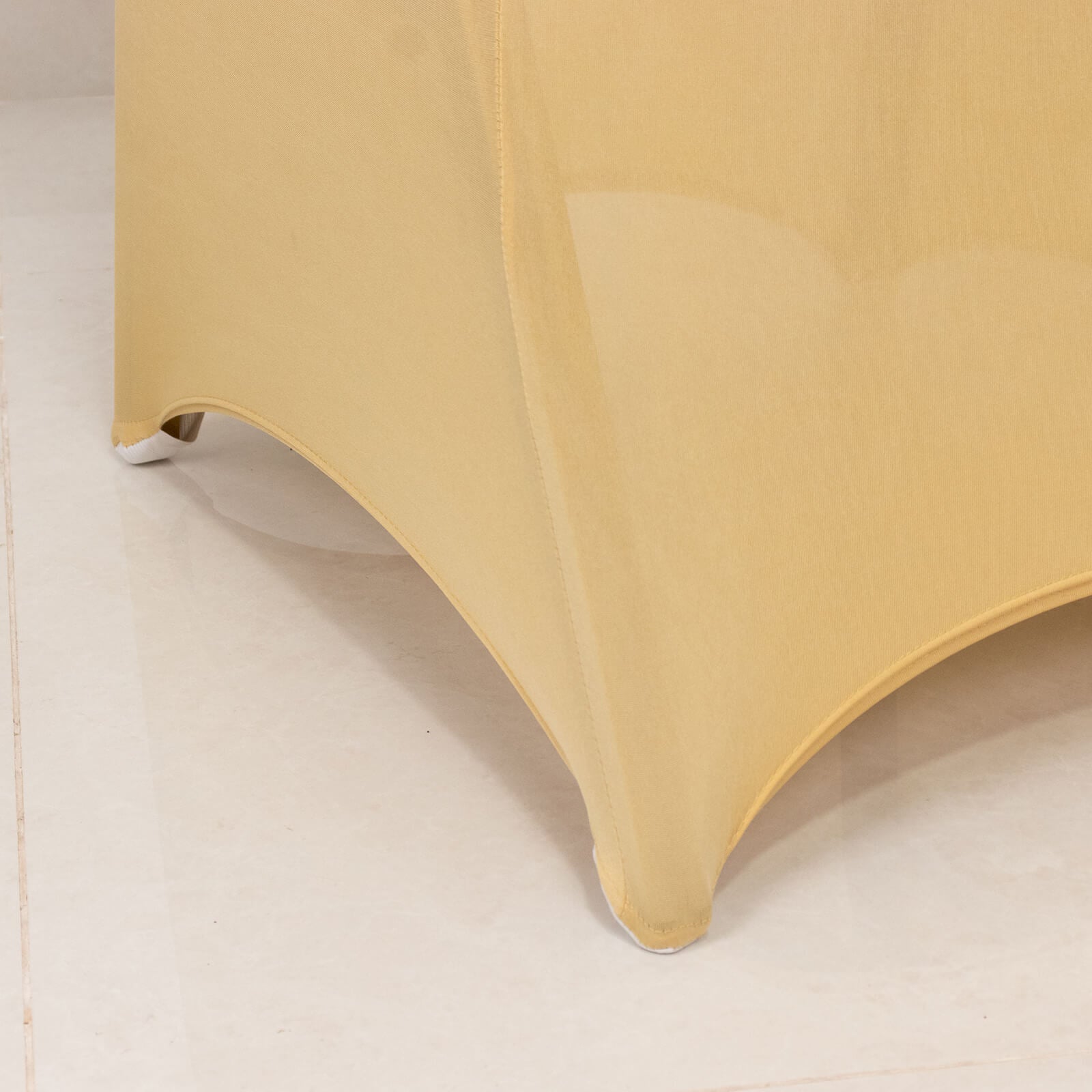 Champagne spandex banquet chair cover with silver rhinestone sash.