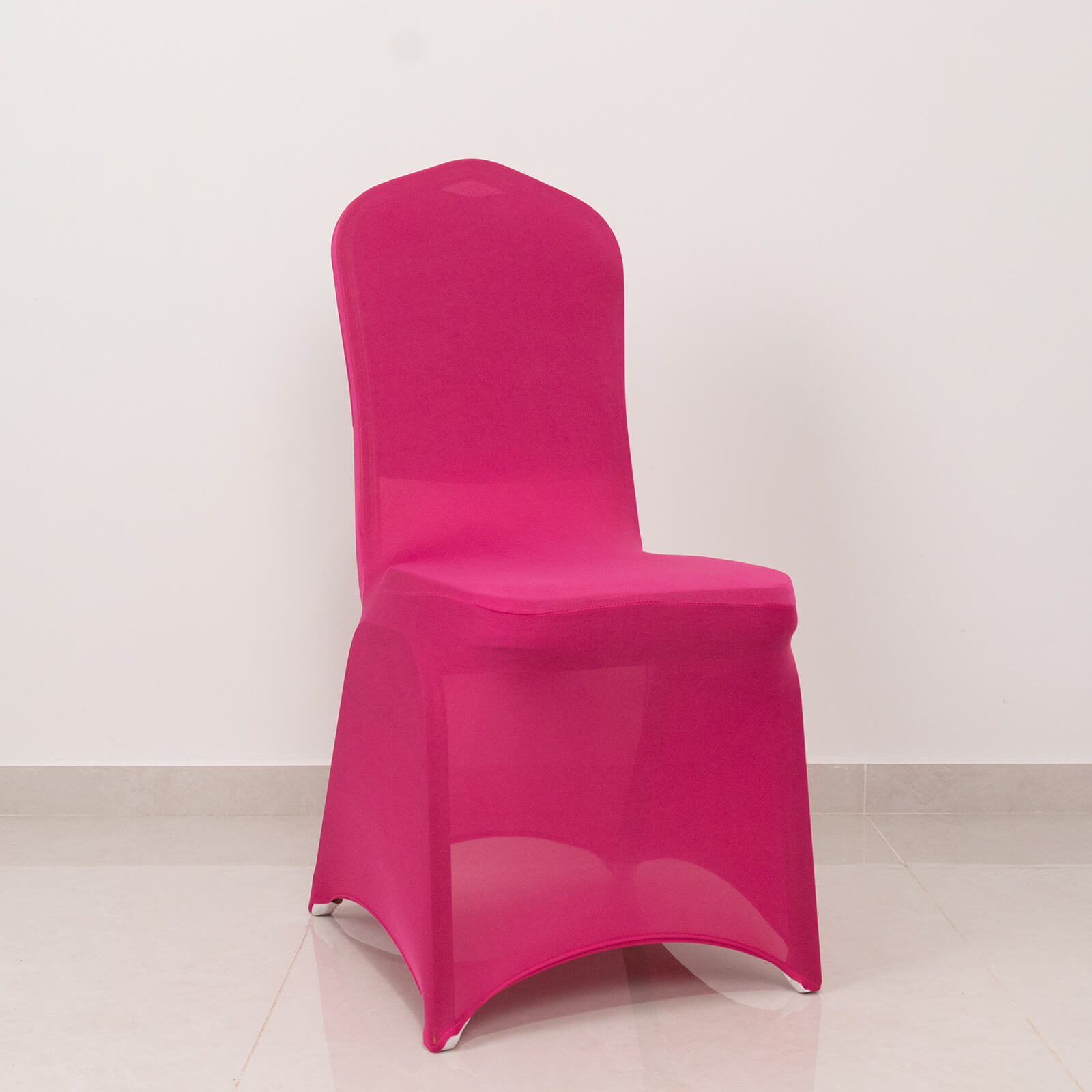 Fuchsia spandex banquet chair cover with rhinestone sash.