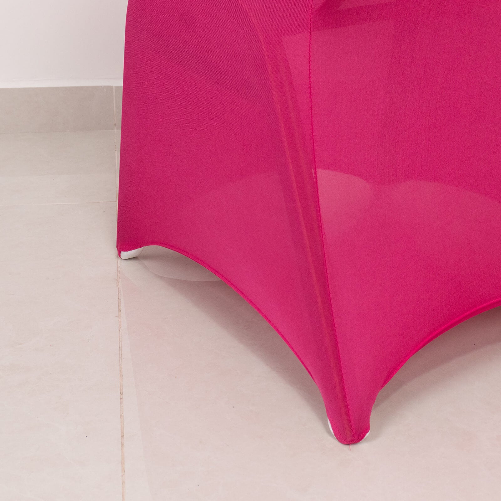 Fuchsia spandex banquet chair cover with silver rhinestone sash.