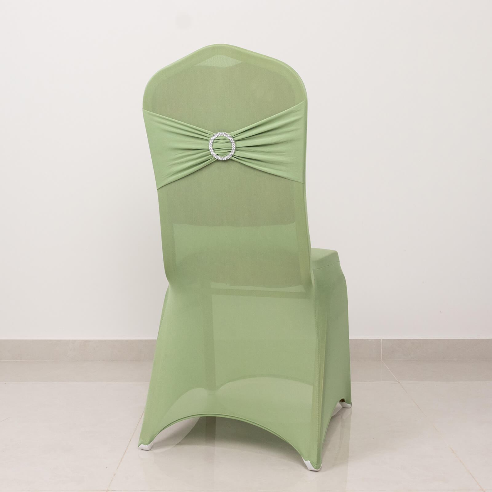 Sage green banquet chair cover with silver rhinestone sash.