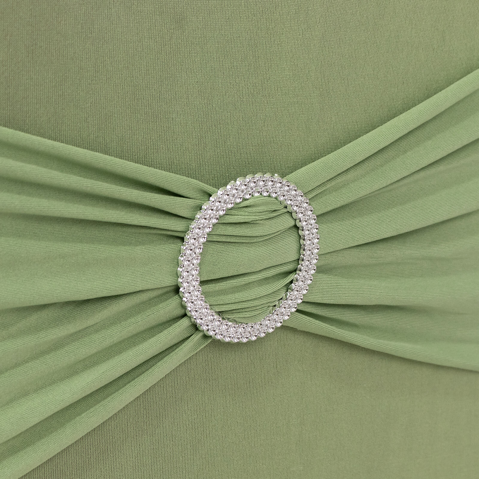 Sage green chair cover with silver rhinestone buckle sash.