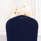 Navy ruffle pleated chair slipcover with floral backdrop.