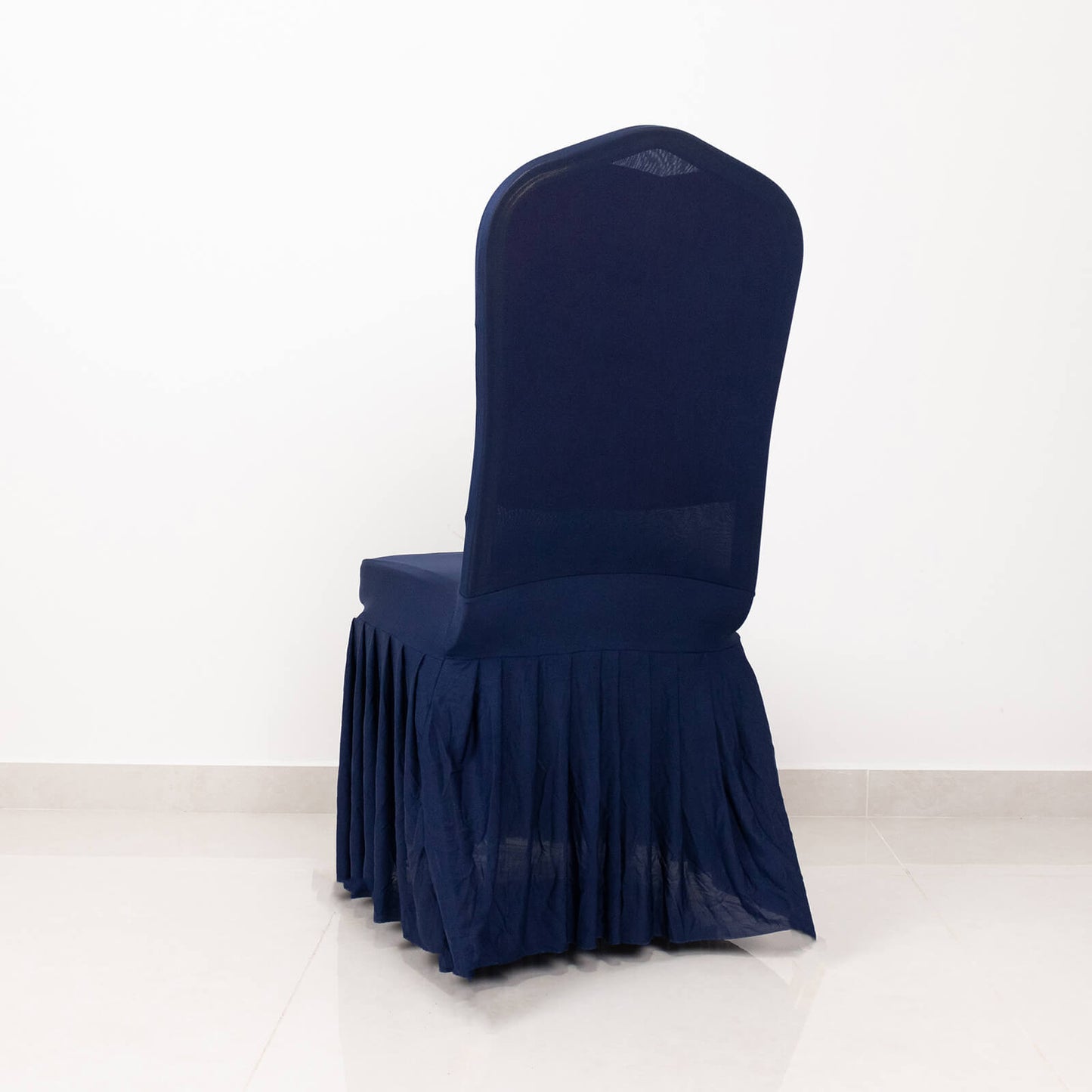 Navy ruffle pleated spandex chair cover for banquet seating.
