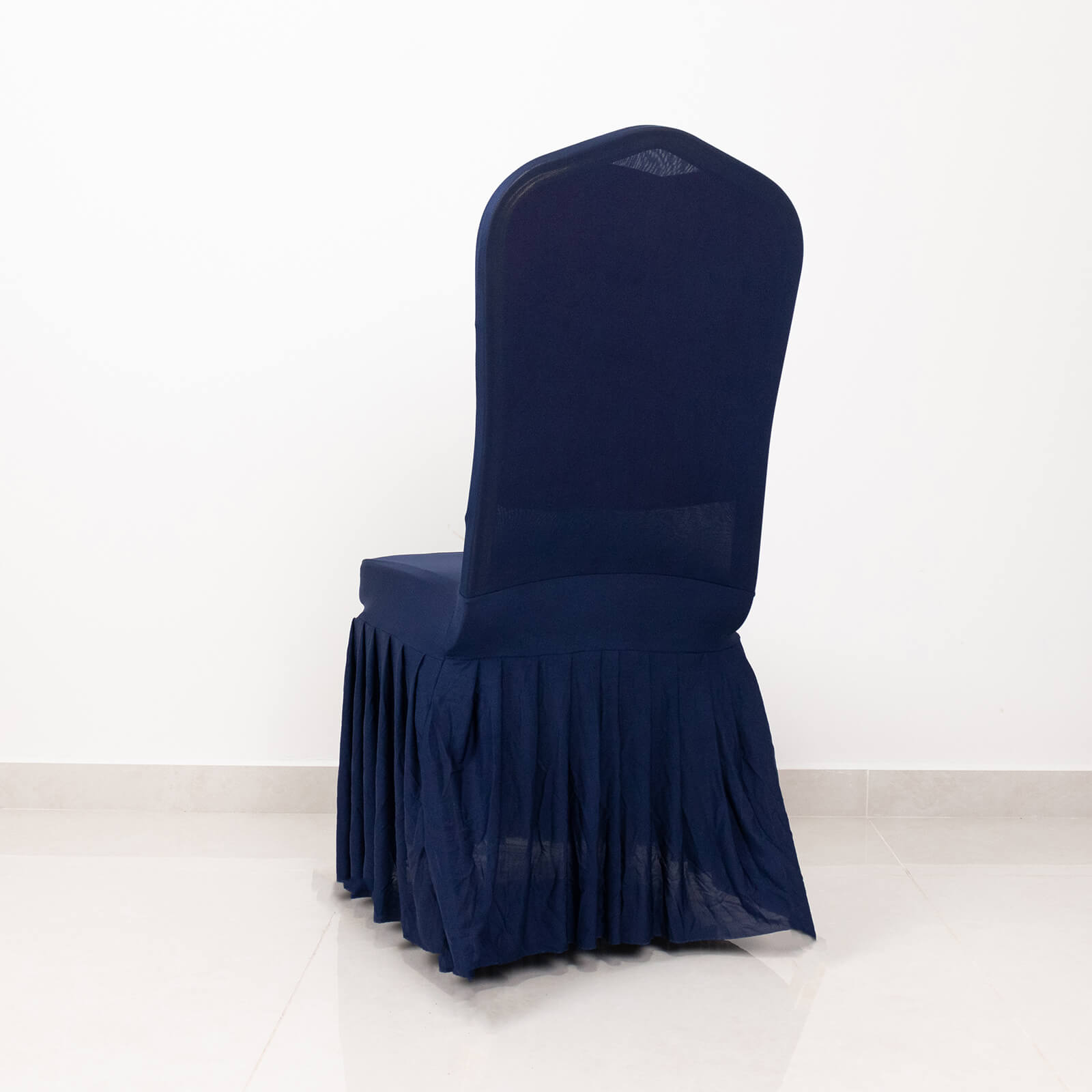 Navy ruffle pleated spandex chair cover for banquet seating.