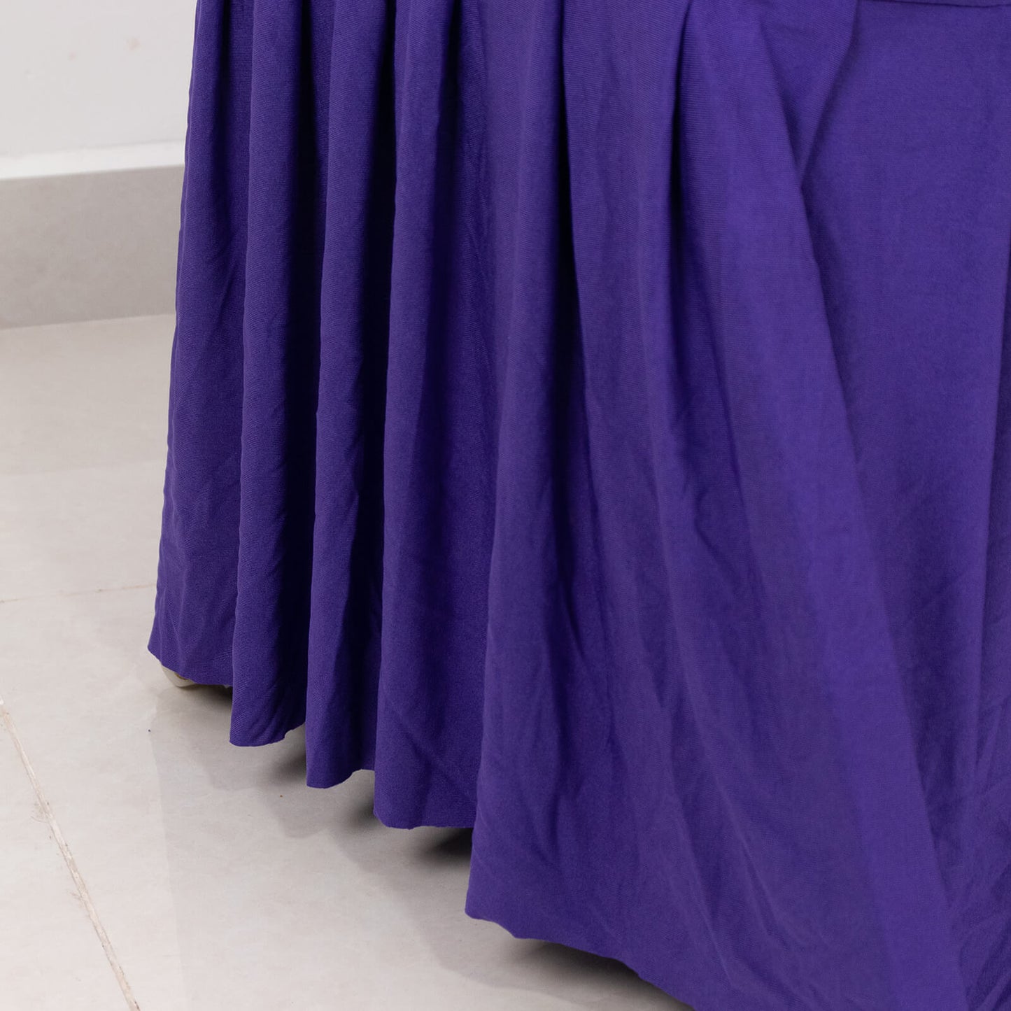 Purple ruffle pleated spandex chair slipcover for banquet seating.