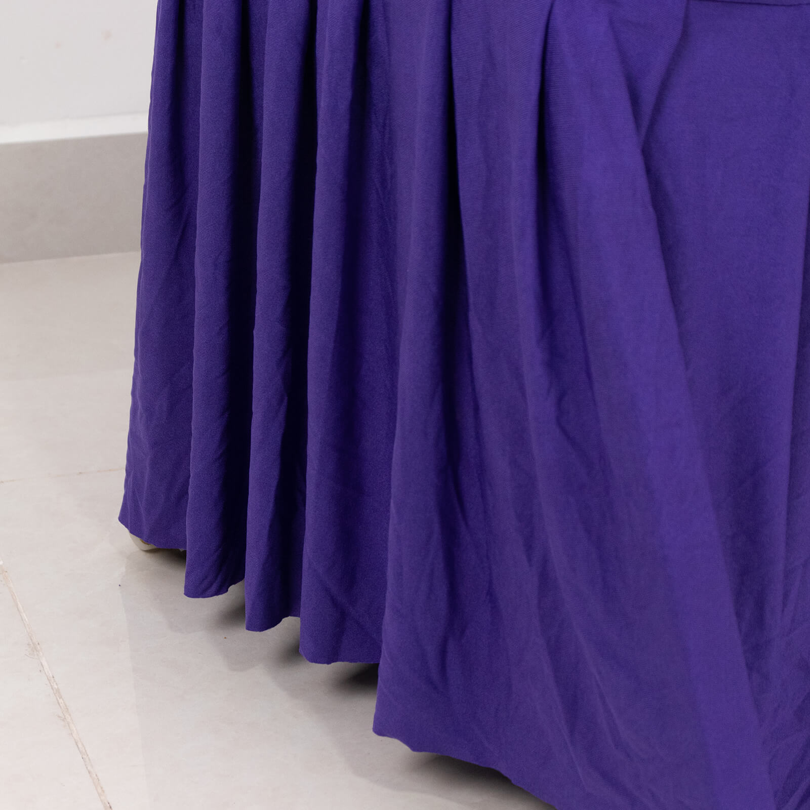 Purple ruffle pleated spandex chair slipcover for banquet seating.