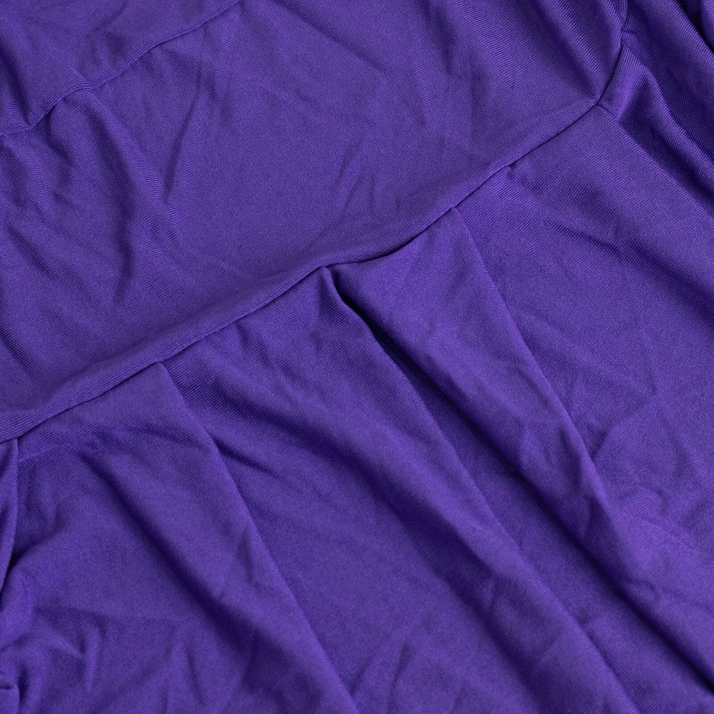Purple stretch fitted chair cover with ruffle pleats for banquet chairs.