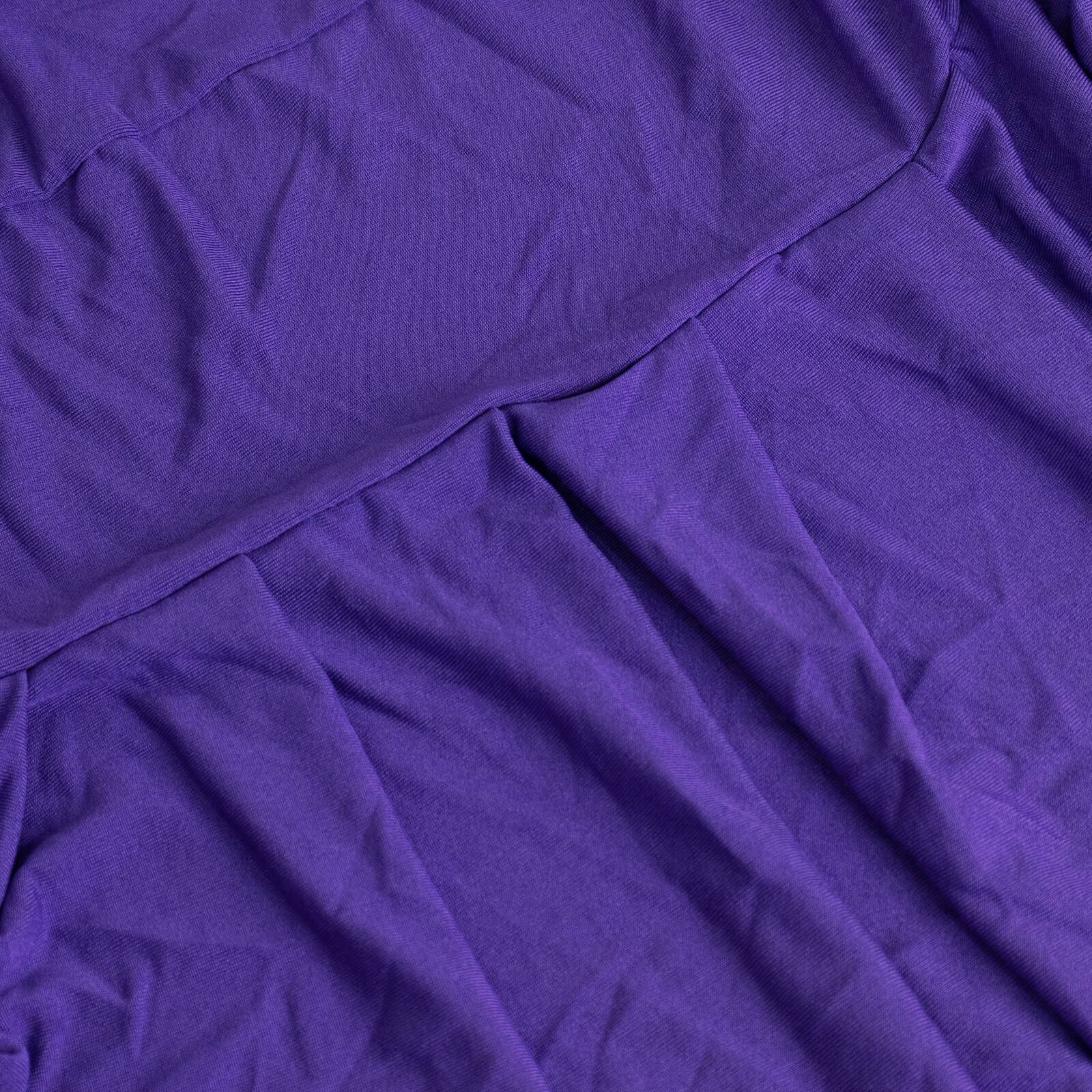 Purple stretch fitted chair cover with ruffle pleats for banquet chairs.