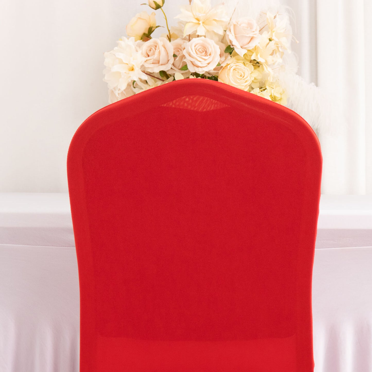 Red ruffle pleated spandex chair slipcover for banquet settings.