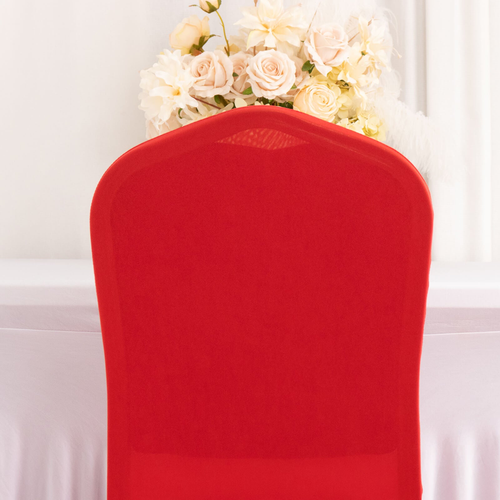 Red ruffle pleated spandex chair slipcover for banquet settings.