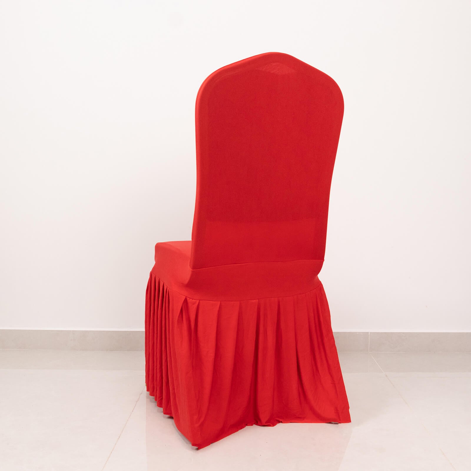 Red ruffle pleated spandex chair slipcover fitted for banquet use.