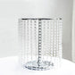 Metallic silver cake stand with crystal chains, 14" round and 16" tall.