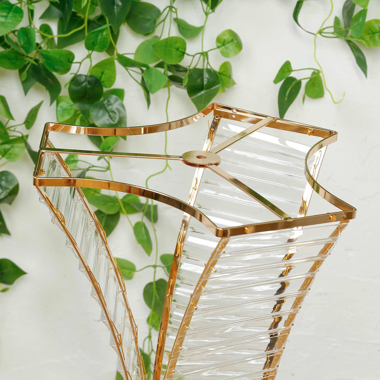 Gold crystal pendant flower stand with hourglass design for table centerpieces.