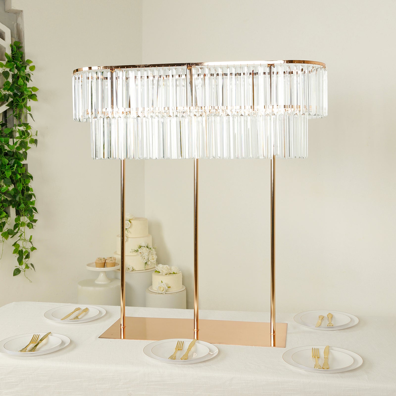 Gold metal 2-tier crystal pendant flower stand centerpiece.