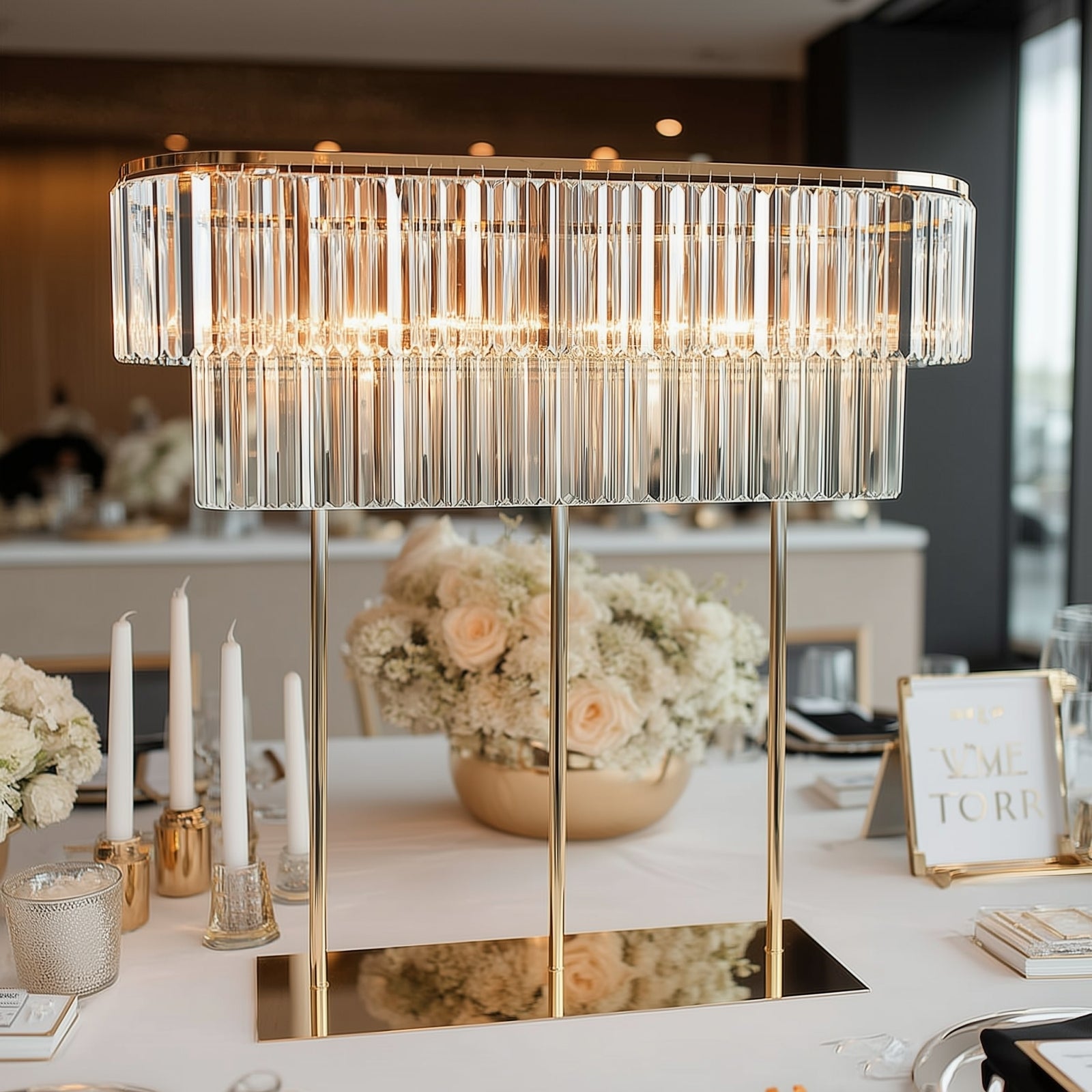 Gold metal 2-tier flower stand with crystal accents, elegant table centerpiece.