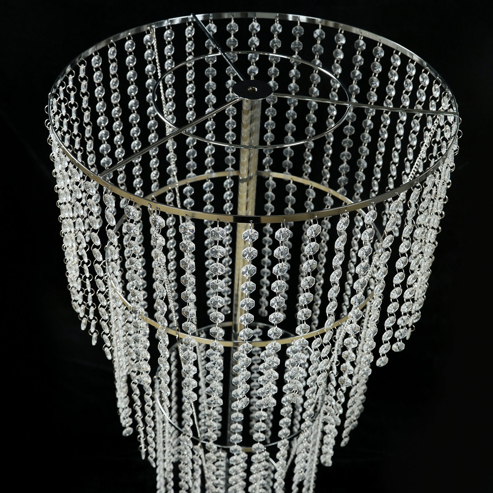 Clear beaded chandelier centerpiece for elegant wedding and party decor.