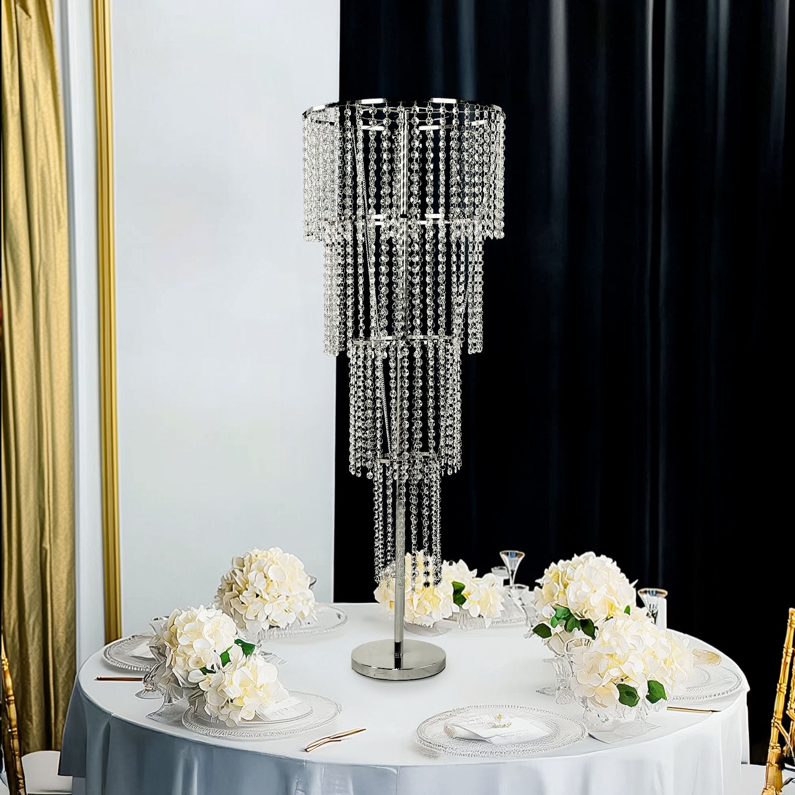 Clear acrylic beaded chandelier centerpiece for elegant wedding table decor.