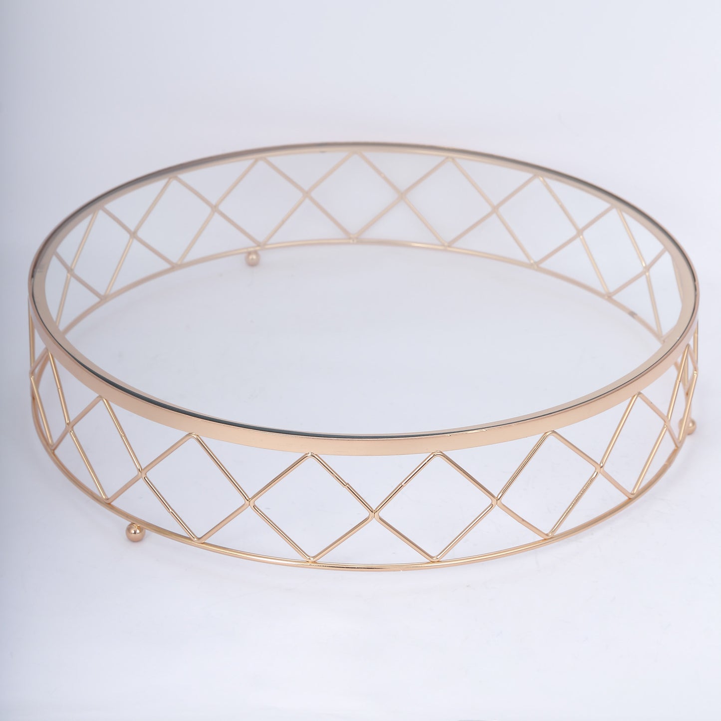 14" gold geometric diamond cut cake stand with glass top.