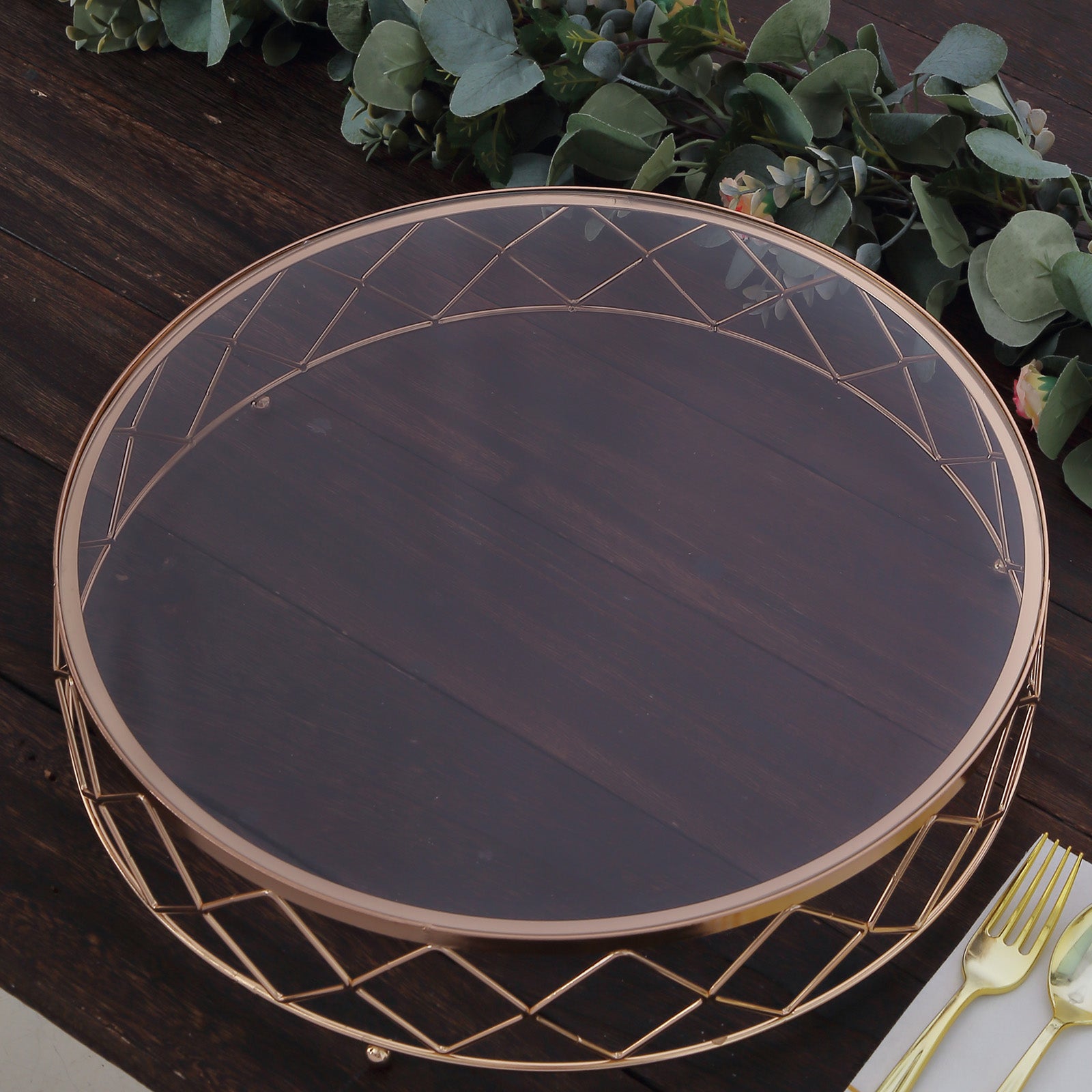 Gold geometric diamond cut cake stand with glass top.