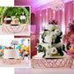Gold geometric diamond cut cake stand with glass top for dessert display.