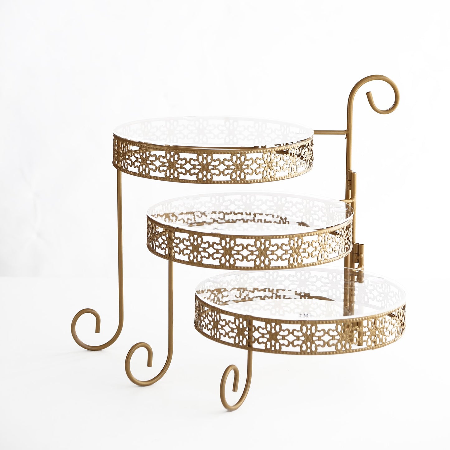 Gold metal rotating 3-tier cupcake stand with clear acrylic plates.