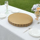 Gold round pedestal cupcake display stand on a table.