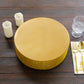 Gold round metal pedestal cake stand with rhinestones.