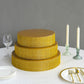 Gold rhinestone round metal pedestal cake stand centerpiece.