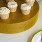 Gold rhinestone dessert table display cake stand with cupcakes.