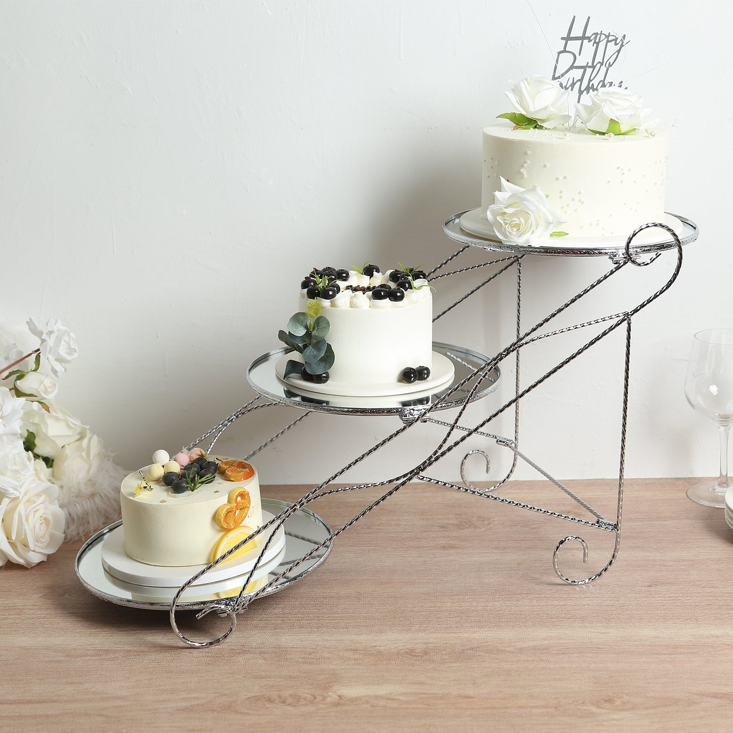 Silver 3-tier cupcake stand with mirror trays, perfect for dessert display.