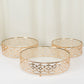 Gold Baroque ornate cake stands with glass tops, stackable dessert trays.