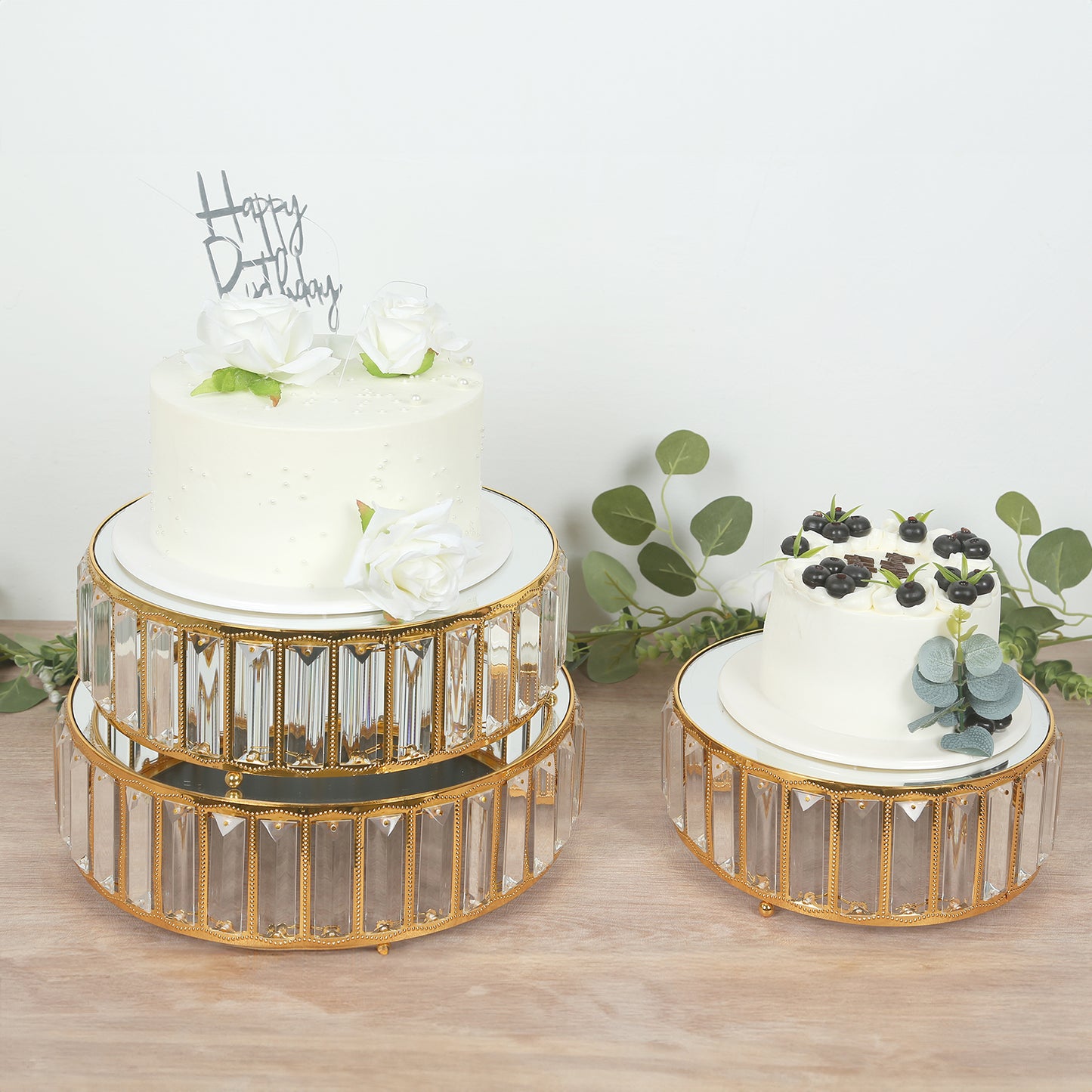 Gold metal crystal pendant cake stands with mirror tops, stackable dessert display trays.