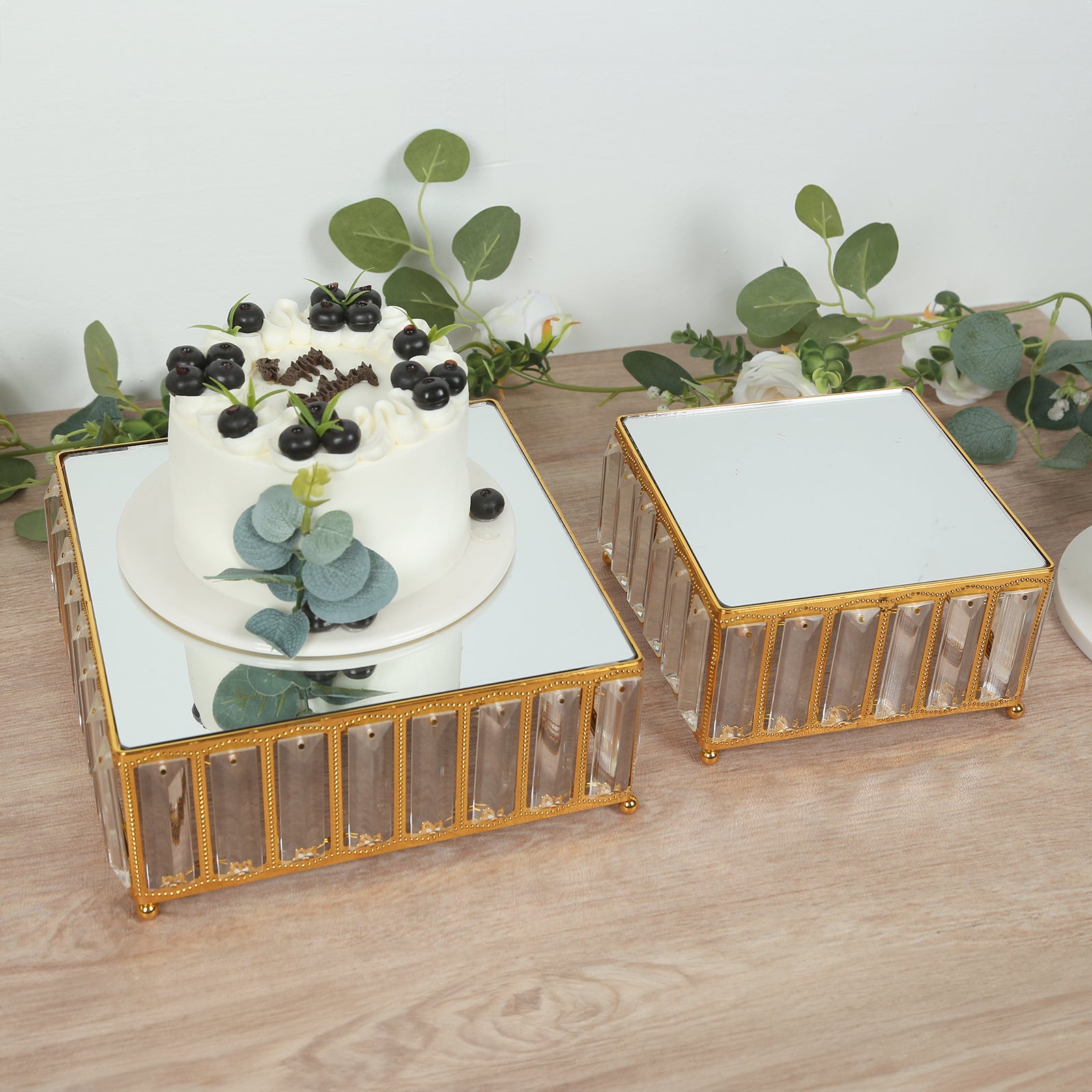 Gold metal crystal pendant cake stands with mirror tops, stackable square trays.