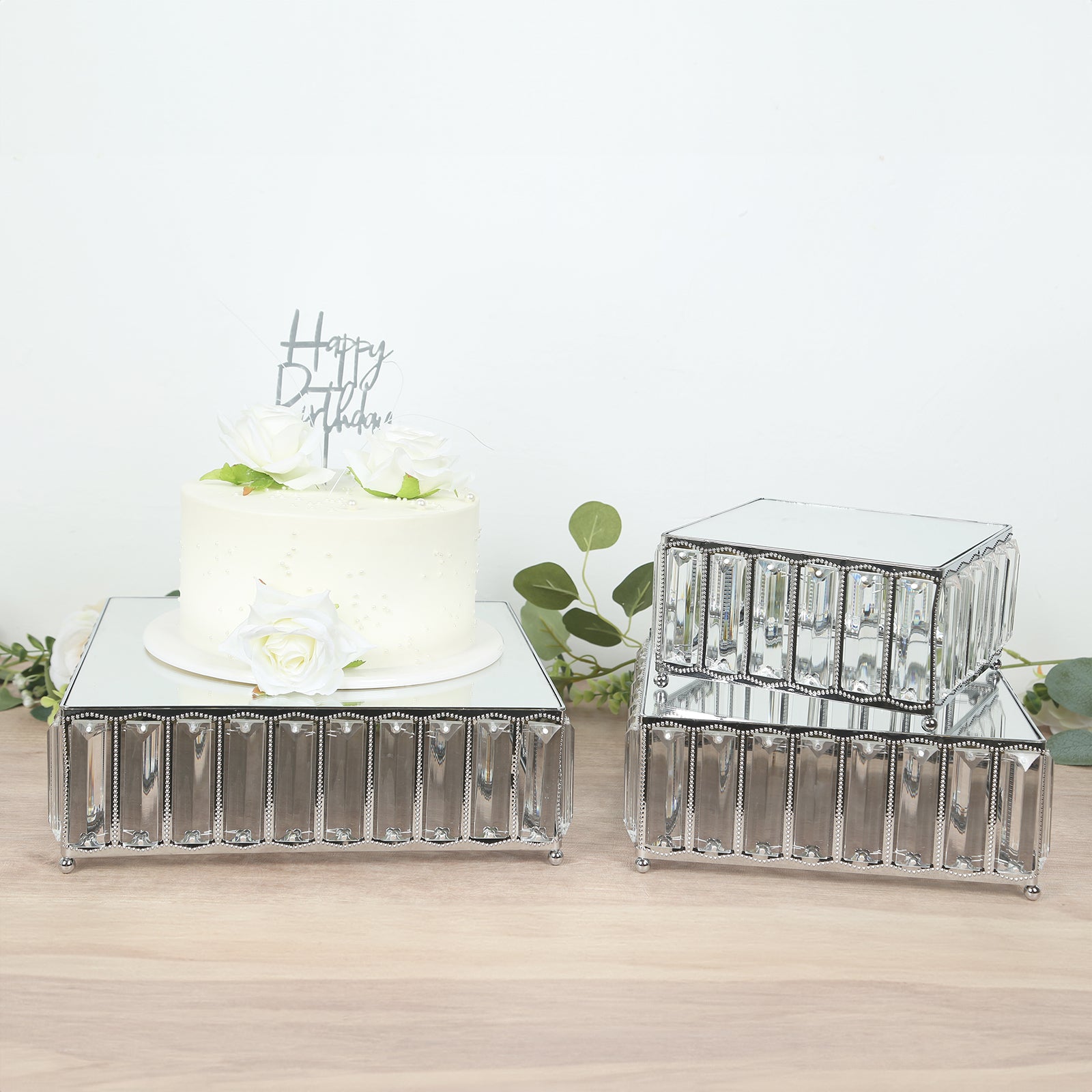 Set of 3 silver metal crystal pendant cake stands with mirror tops.
