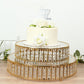 Gold round cake stand with hanging crystal beads and glass top, perfect for dessert display.