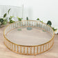 Gold cake stand with hanging crystal beads and glass top.